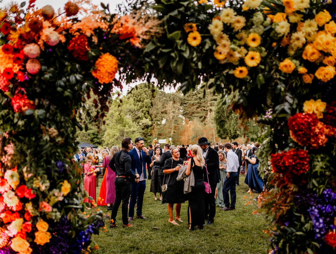 At each venue guests take a bush walk which opens to the stunning venue,
this time through a floral archway down Craggy Range Road in 2022