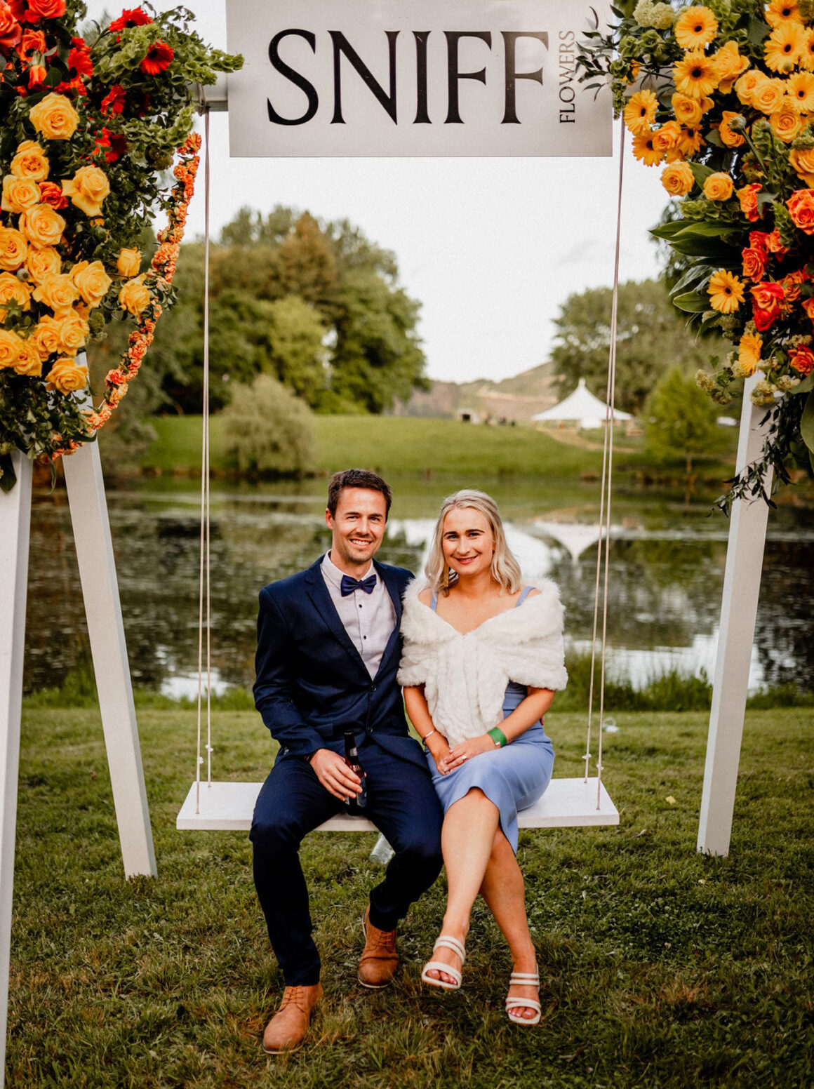 The swing decorated by Sniff Flowers is a focal point for
photos – here by the lake on the Williams property in 2022