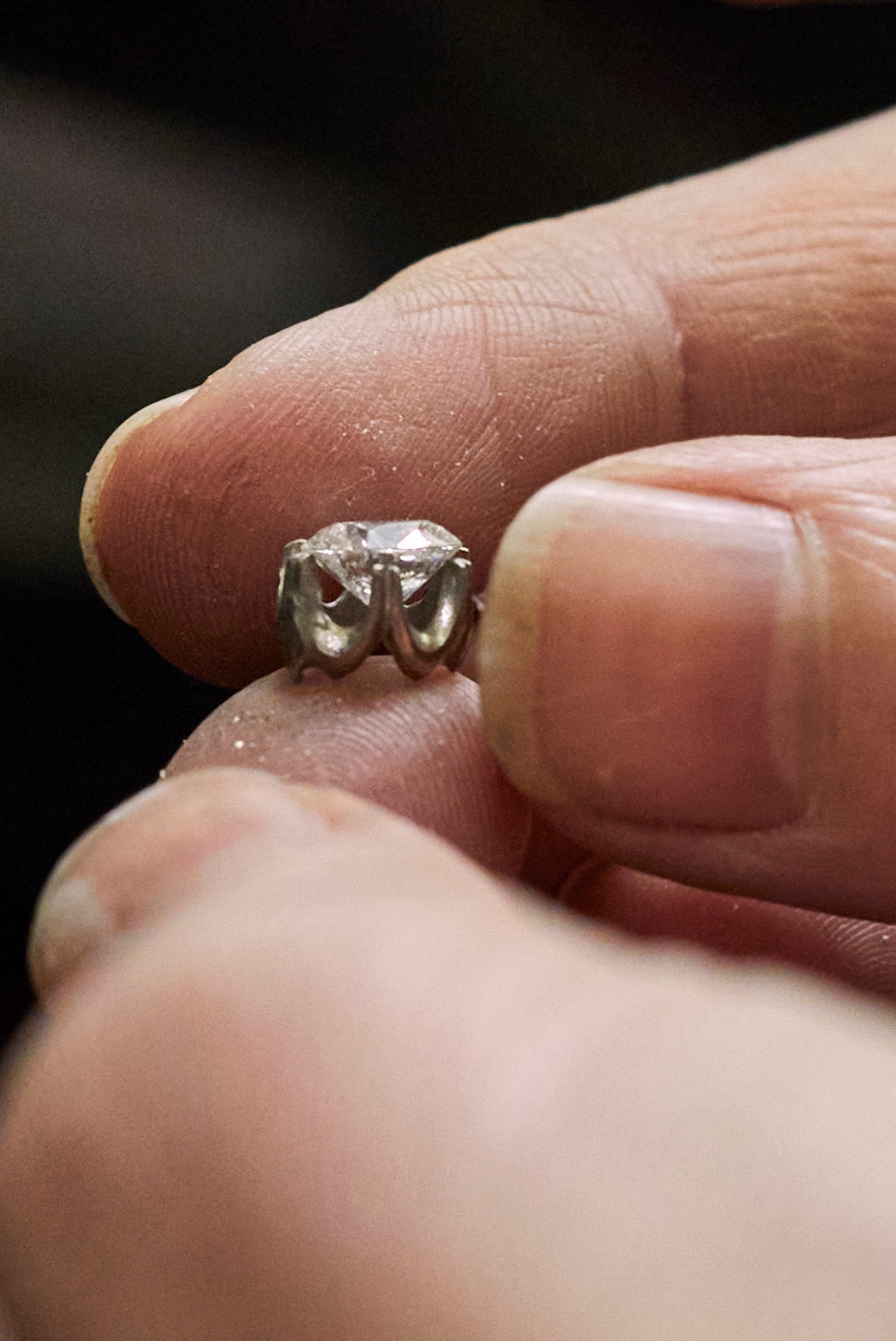 THIS PAGE: Monique hand making a
traditional Rex setting for a diamond ring